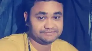 SHEKHOR She jeno amar pashe ajo boshe ache.