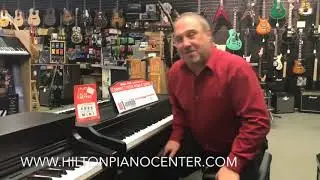 Holiday special on Roland RP102 and RP501R Pianos at Hilton Piano Center Free Ipad mini