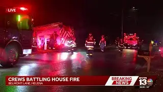 Multiple fire departments battle large house fire in Helena