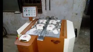 S.M.T Four wheel edge grinding and buffing machine.