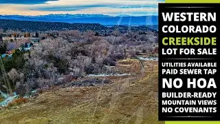 Explore this Colorado Creekside Lot for Sale | Ideal Vacant Land with Utilities to Build a House