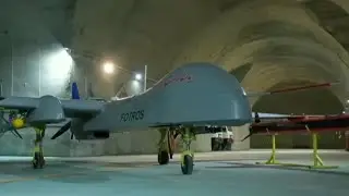 Iran unveils underground air force base with drones and missiles