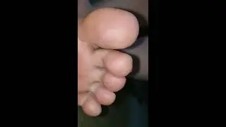 Coconut lotion feet sock removal.