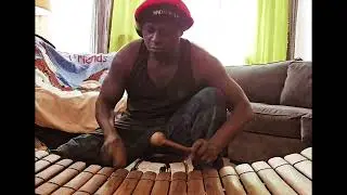 Oumar Sagna exploring a Joola tune on balaphon