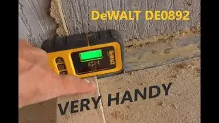 Using a laser detector to help set plumb up timber stud walls.***DeWalt DE0892***