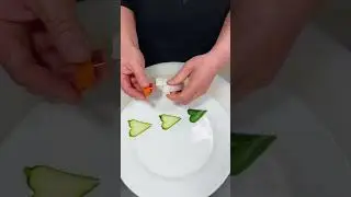 Top chefs teach you how to cut green cucumber flowers! #fruitdisplay #foodcarving