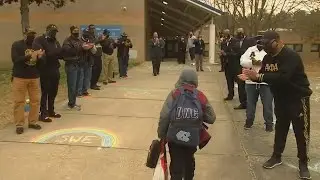 Fraternity brothers prepare to welcome students with school supplies