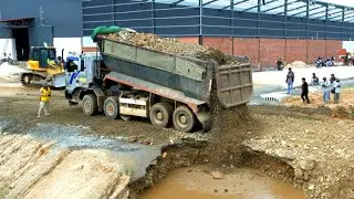 Incredible Heavy dump truck 25.5T unloading soil landfilling with Bulldozer SHANTUl DH17C3 pushing 