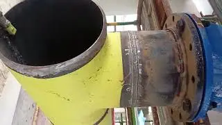 Spool fitting and installation in a cooling tower involves assembling, aligning, and securing pipe