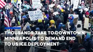 Thousands take to downtown Minneapolis to demand end to US ICE deployment