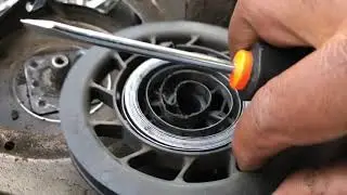 Cómo reemplazar la cuerda de arranque de un cortacesped parte 1
