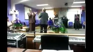Old white man sings country song in black church
