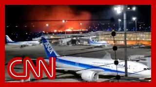 See moment planes collide at Tokyo airport