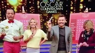 Kelly Ripa wears a VERY LUCKY grey skirt...{side view=impressive} 👩🏼🍑👀👀👀🙀😋🖤💛🖤🇺🇸