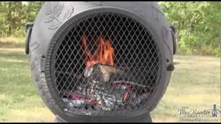 Yule Log Fire in a Blue Rooster Dragonfly Cast Aluminum Chiminea