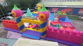 Rainbow Castle Inflatable Adventure Park: Full-Color Obstacle Fun for All!