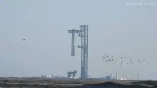 SpaceX Mechazilla launch tower arms hold Starship Flight 7 booster | South Padre Island Texas