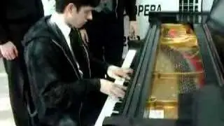 James Carroll Playing Piano at the Arts Garden in Indy