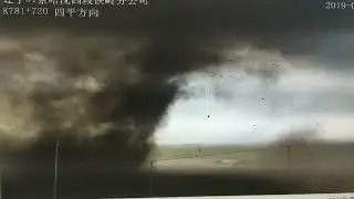 EF4 Tornado Blows Truck off Highway near Kaiyuan, China (CCTV)