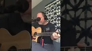John Lennon watching the wheels cover