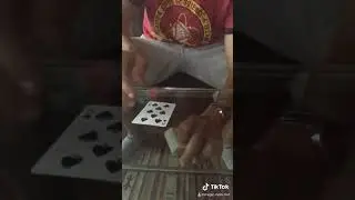 Card thru glass table magic trick