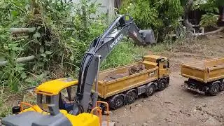 Toy Construction Trucks Moving Mountains of Sand!