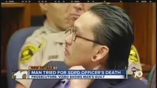 Prosecutors reveal cellphone video in trial of man accused in officer's death