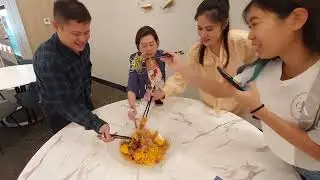 Tossing to wealth with Ya Ge's Prosperity Smoked Salmon Yu Sheng.