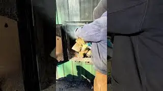 Heating my house with free scrap wood #woodstove #woodboiler