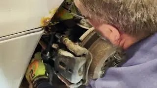 How to Replace Rear Brakes and Rotors on a 1998 Lexus LS400