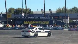 Mustang drag police chasing raptor at SEMA 2014