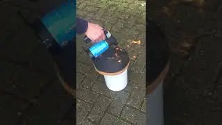 Scorching a Piece of Wood for Relief Printing