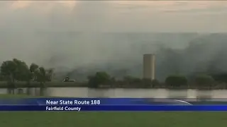 Firefighters work to contain Amanda Twp. fire