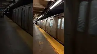 R143 L Train departing Graham Av