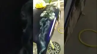 Airbrushed Batman Villains on a Harley Davidson motorcycle tank