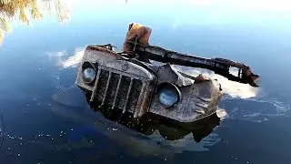 A SOVIET WWII-ERA STZ-5 ARTILLERY TRACTOR WAS FOUND IN A SWAMP.