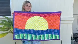 Sophia and Her Quilted Technicolor Dream Tapestry