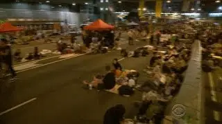 Hong Kong protesters linger despite calls to vacate camps