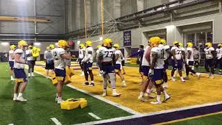 LSU offensive linemen work with coach James Cregg