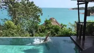 Slomo diving. A girl is diving. Pool swimming.  Diving girl. Art video. Short video blue water.