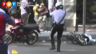 New video: Cop points gun at protestor (Backup Copy)