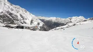 Great skiing day in Saas Fee in March 2023 from Morenia to the town