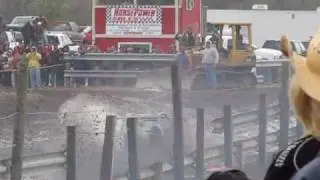 Trucks Gone Wild Tri Truck Challenge Bithlo Mud Racing White jeep, Pup, and Pitbull