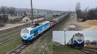 Тепловоз ТЭ33АС-3009 с грузовым поездом 