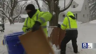 Garbage truck drivers brave the cold