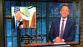 Seth Meyers and Wally the Cue Card Guy