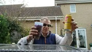 Drinking Tennent's Lager from Scotland 