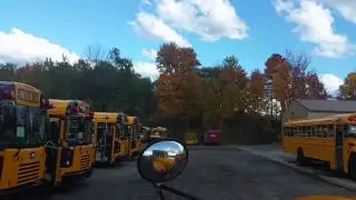 Blue Bird International 3800/T444-E 5 speed spicer drive around the lot.
