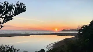Sunrise at Terrigal Lagoon. Reflections. Silhouettes.