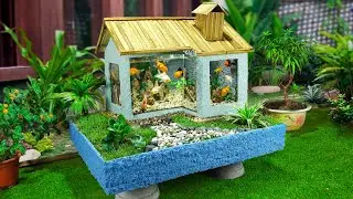 The combination of cement and bamboo makes a very beautiful fish tank